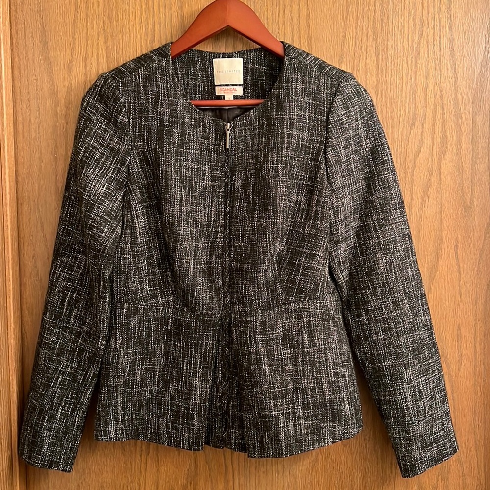 The limited jacket from the scandal collection. Size small. Zips up.